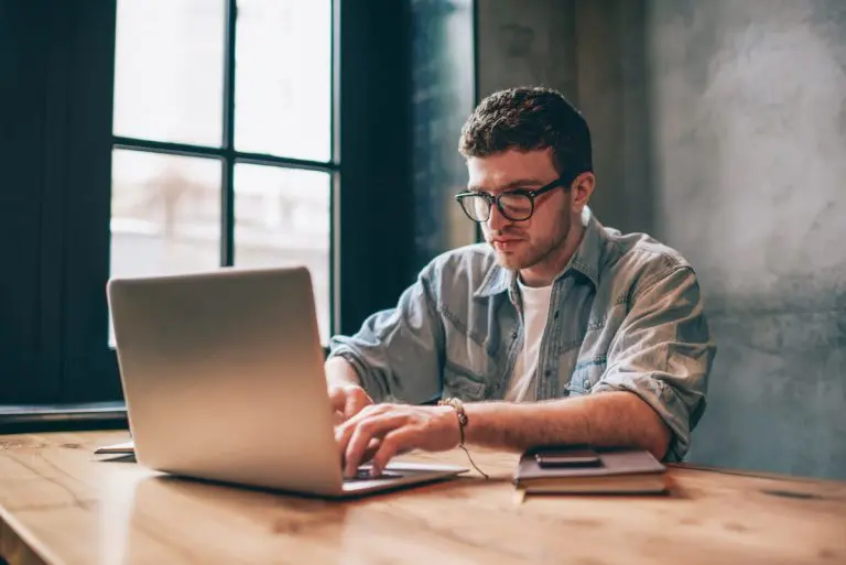 man working on laptop