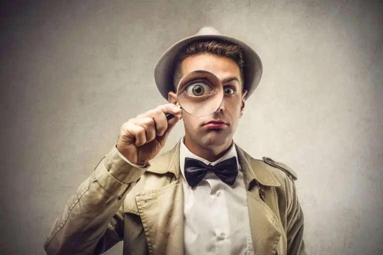 man with magnifying glass