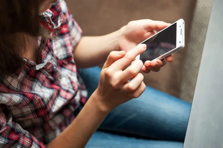 using smartphone in hands